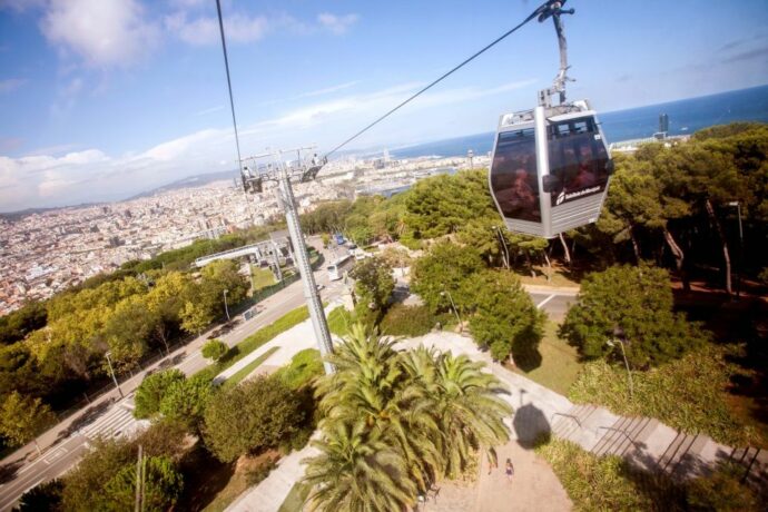 a cable car to take your family at the top of Montjuic hills in Barcelona